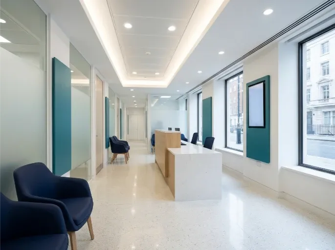 A bright, modern healthcare clinic reception and waiting area